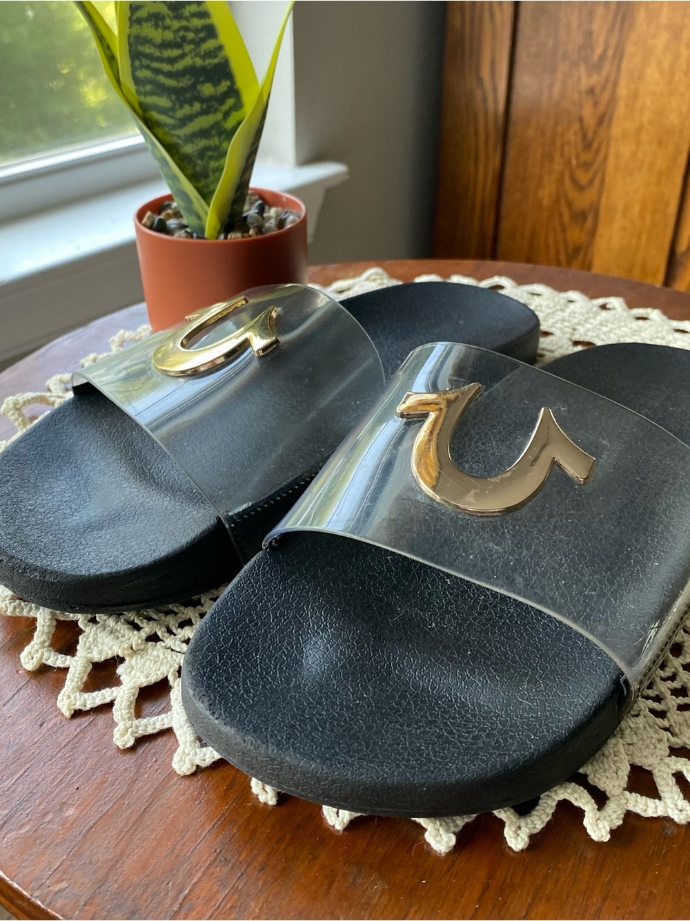 True Religion Clear Strap Black Slide Sandals with Gold Logo EUC